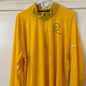 Nike training top with reflective accents.